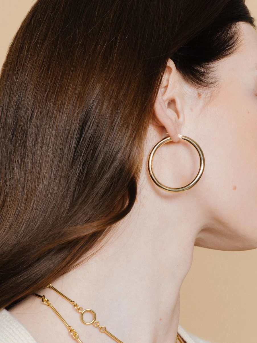 The Gild Medium Hollow Hoop Earrings in Yellow Gold - 14K Lightweight Hoops for Women